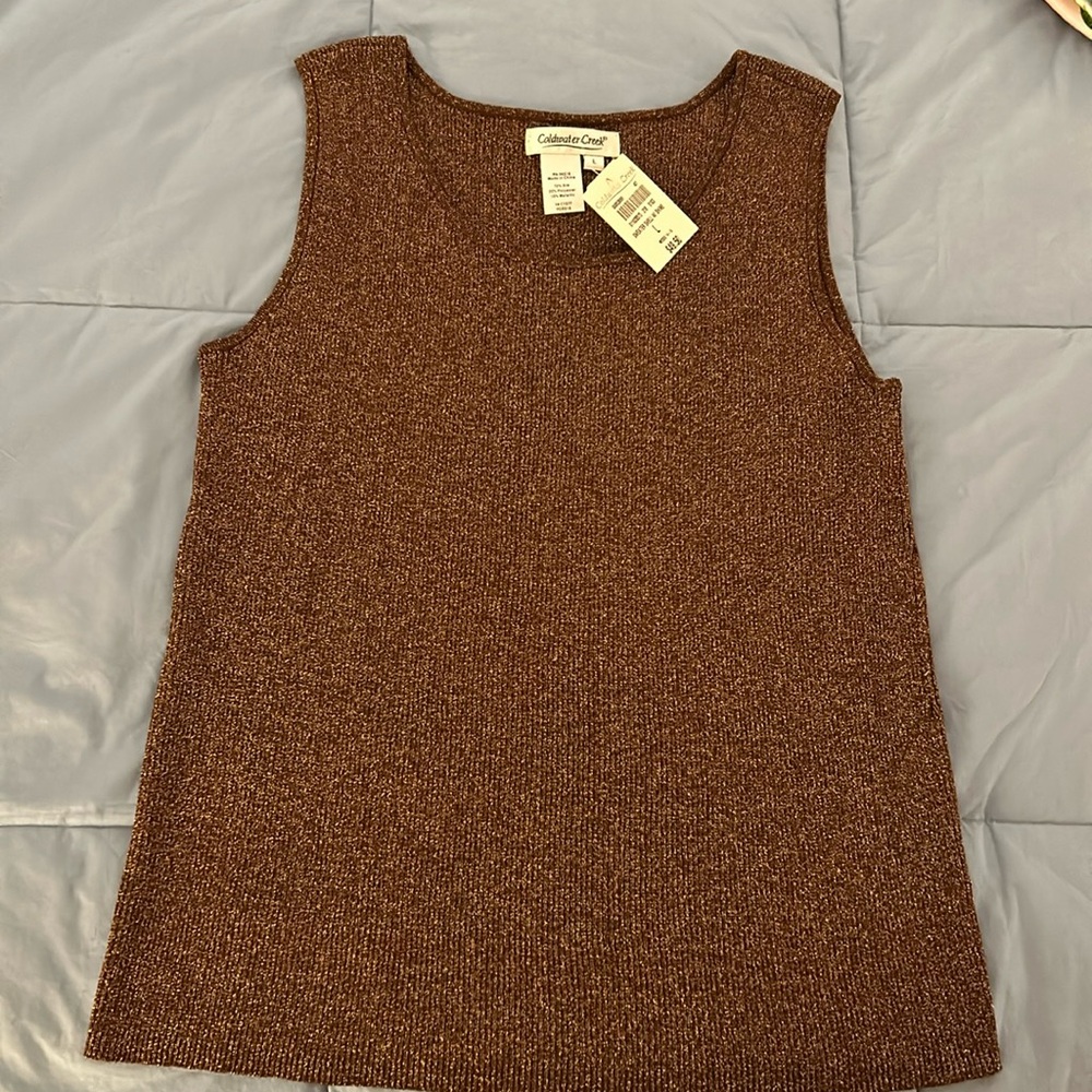 Sleeveless sweater with sparkle threading